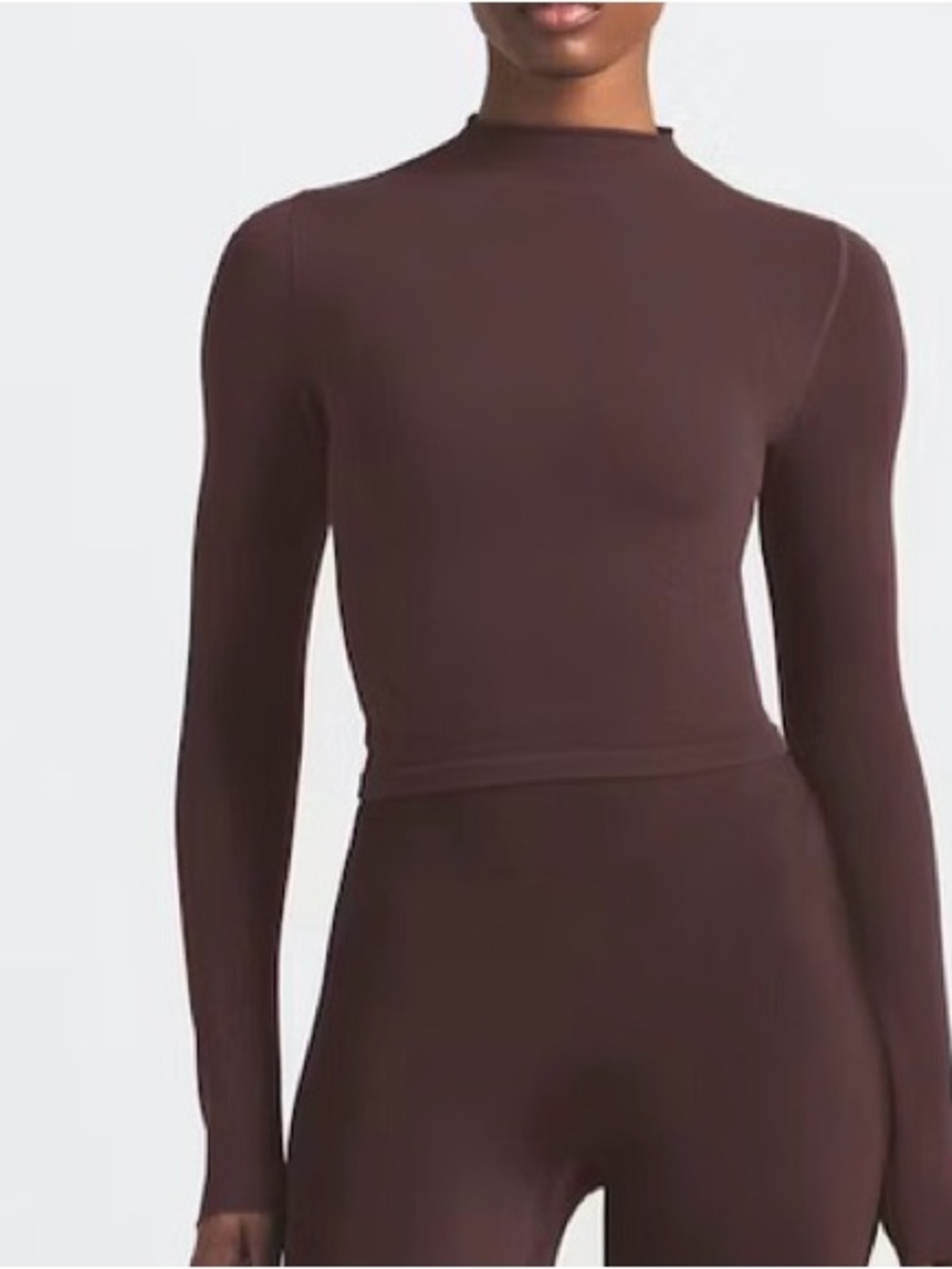 Nike x SKIMS Vintage Seamless mock-neck crop top in the color Phoenix